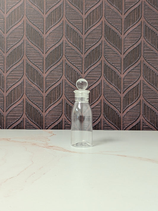 CLEARANCE | 1 oz Plastic Bottle with decorative cap | 22 count