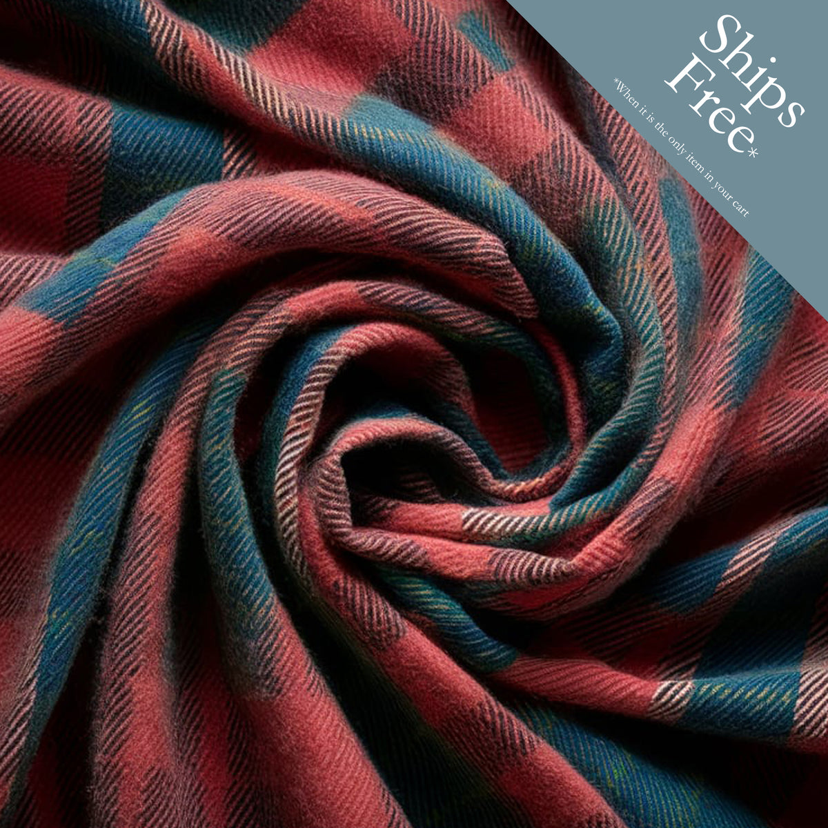 Rustic Strength, photographic image of red-dominant plaid flannel fabric bunched into a spiral with badge that reads, "Ships Free* When it is the only item in your cart"