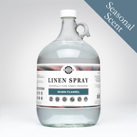 Rustic Strength Wholesale, Linen Spray, 1 Gallon, Glass Jug, Warm Flannel with Seasonal Scent